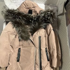 Pink worn Mackage coat